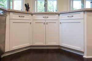 Showcase the elegant white cabinet doors 