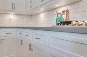 Gary Hoffman kitchen with concrete countertops and white shaker cabinets