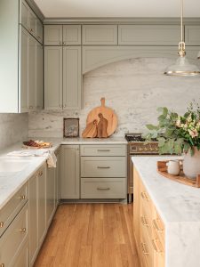 A beautiful kitchen with light gray cabinets