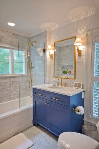 Picture of a beautiful bathroom with the blue color cabinet
