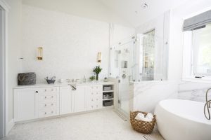 Picture of a luxury big bathroom with bathtub and cabinets
