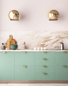 green cabinets with golden handles shown in the picture