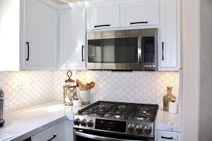 beautifu kitchen interiors with white cabinets shown in the picture